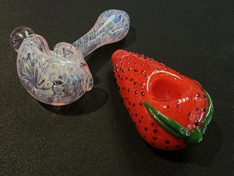 Glass bowl beside CBD products at Ethnic Concepts